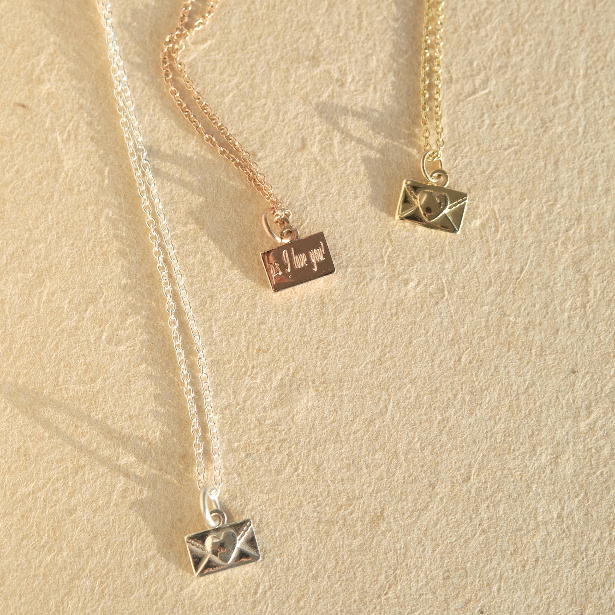 LOVE LETTER CHARM – Ernest Joe